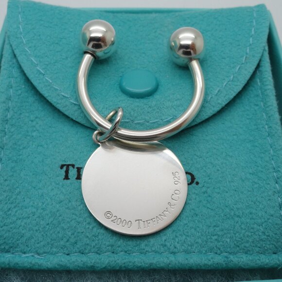 Tiffany & Co. Sterling Silver Globe Airplane Key Ring  Tiffany & Co. Sterling Silver Round Globe Keychain Key Ring